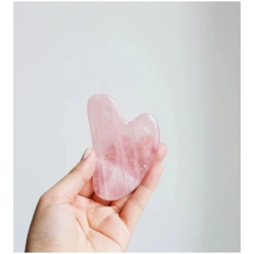 gua sha quarzo rosa I Tesori della Terra