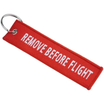 Fostex - "Remove Before Flight" piekariņš - sarkan